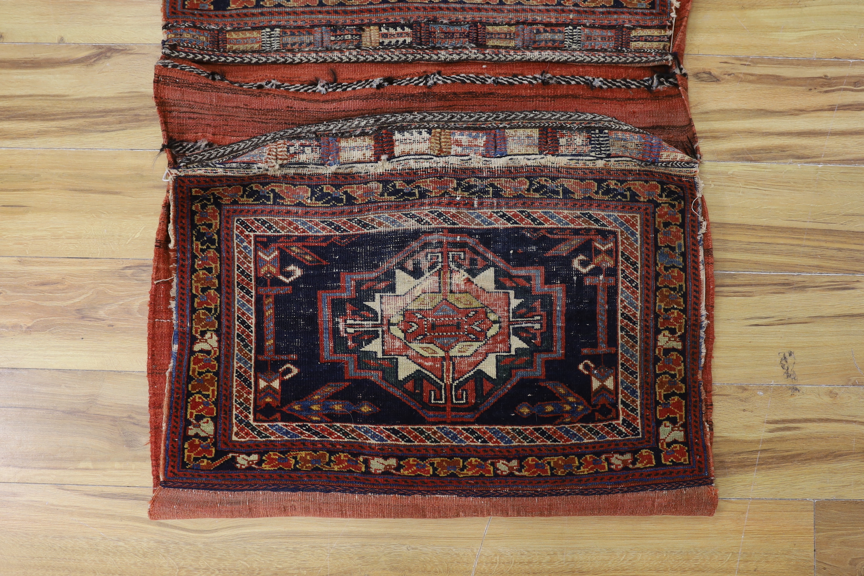An Afshar blue ground saddle bag, 120 x 79cm